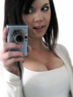 Super cute teen takes selfshot pictures of herself in the mirror